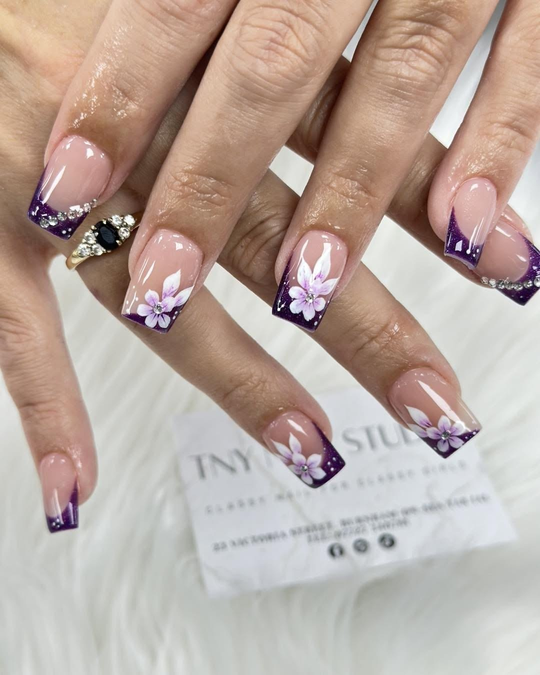 Purple floral square-tip manicure
