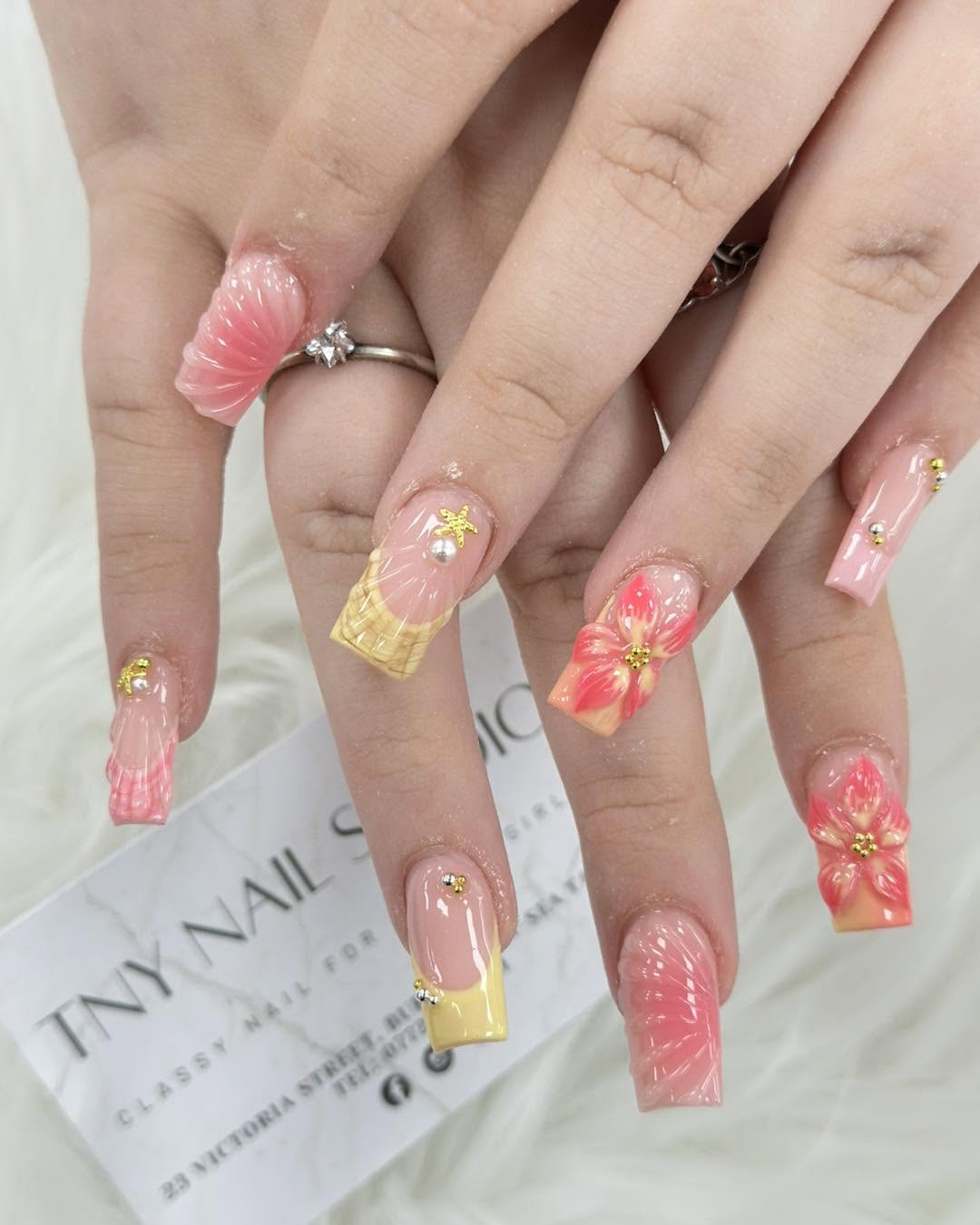 Coral floral statement nail art