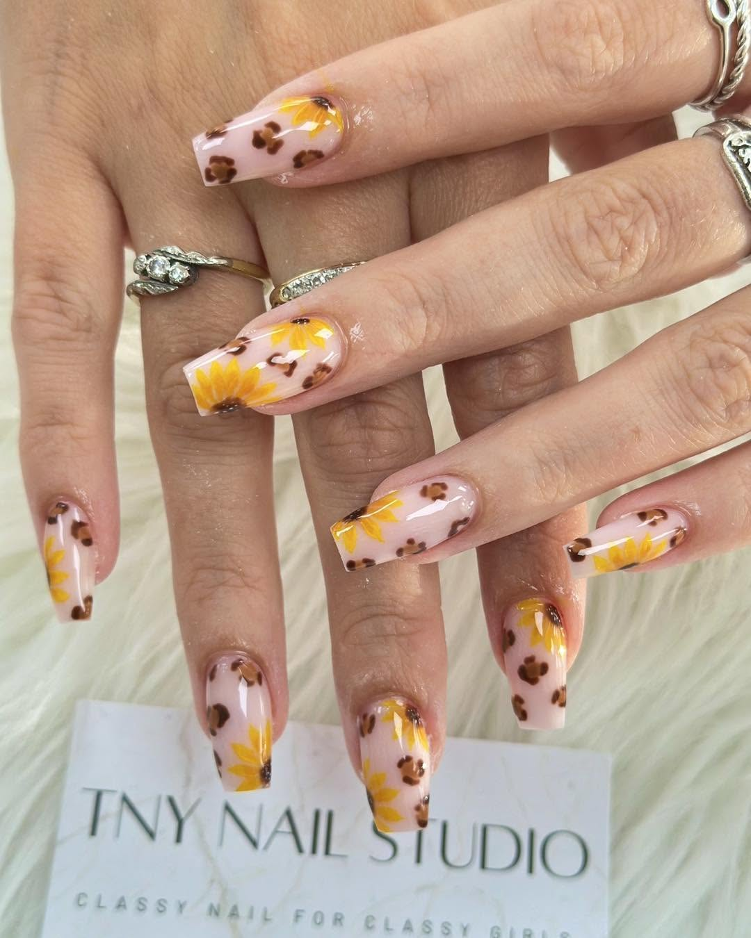 Sunflower and floral nail art